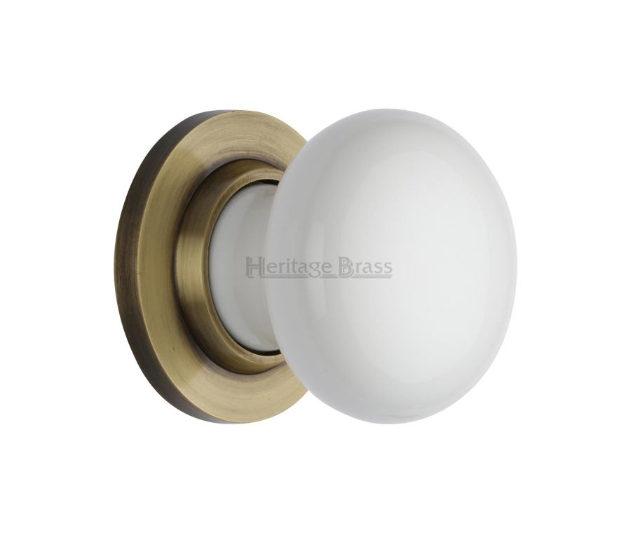 Heritage Brass Antique Brass Plain White Porcelain Door Knob on Rose