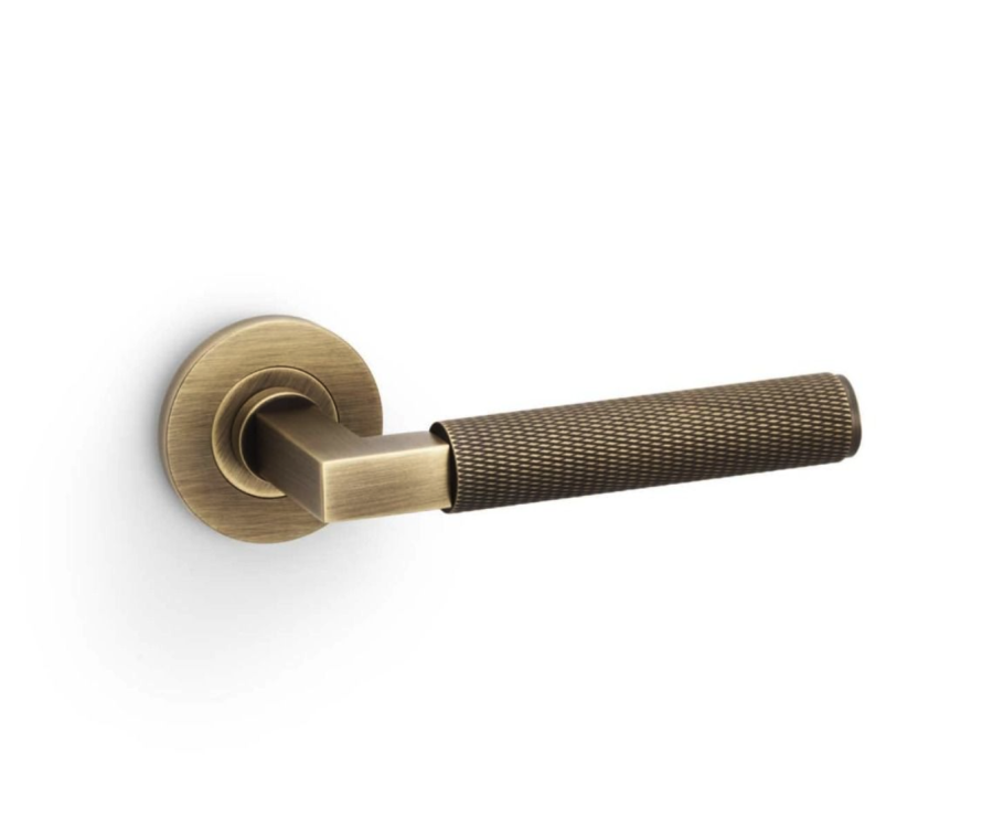 Alexander & Wilks Antique Brass Hurricane Knurled Lever on rose | AW200AB