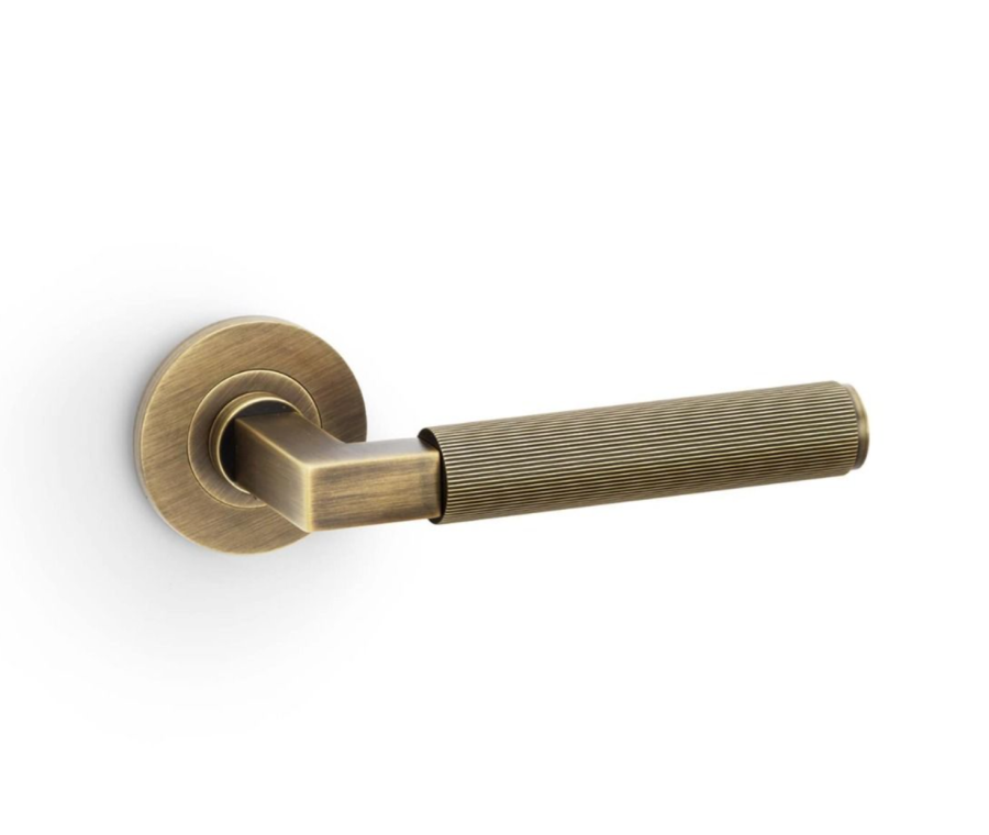 Alexander & Wilks Antique Brass Hurricane Reeded Lever on rose | AW202AB