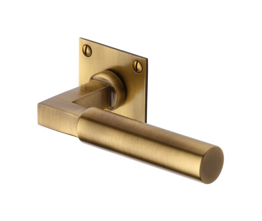 Antique Brass Bauhaus Low Profile Door Handle on Square Rose
