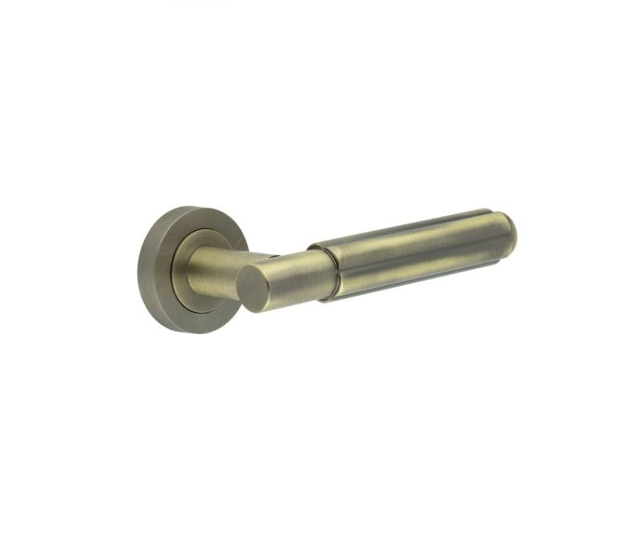 Sets Antique Brass Bloom Lever Handle on rose | JV848AB