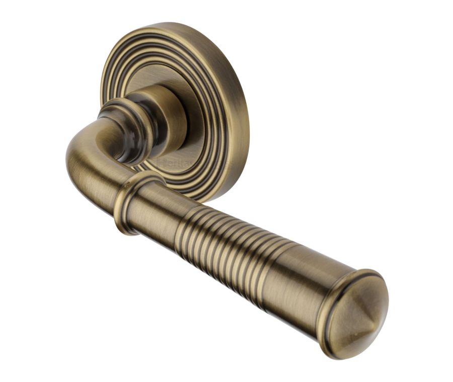 Antique Brass Bridgetown Reeded Door Handle on Round Rose