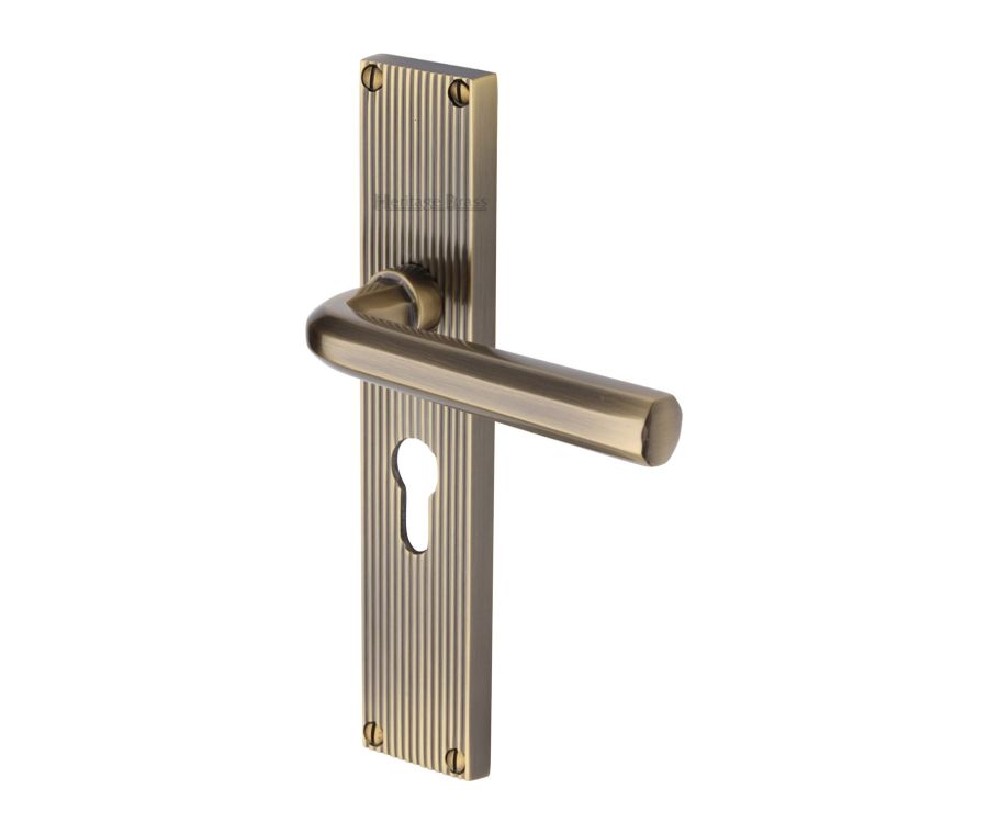 Heritage Brass Antique Brass Octave Reeded Door Handle on Plate - Euro Profile