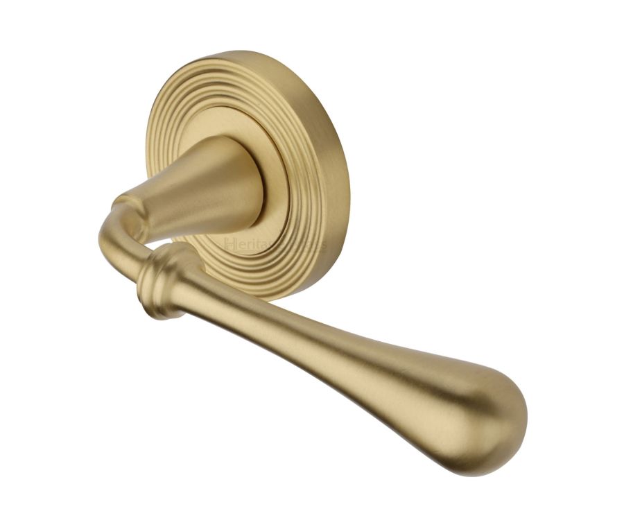Satin Brass Roma Reeded Door Handle on Round Rose