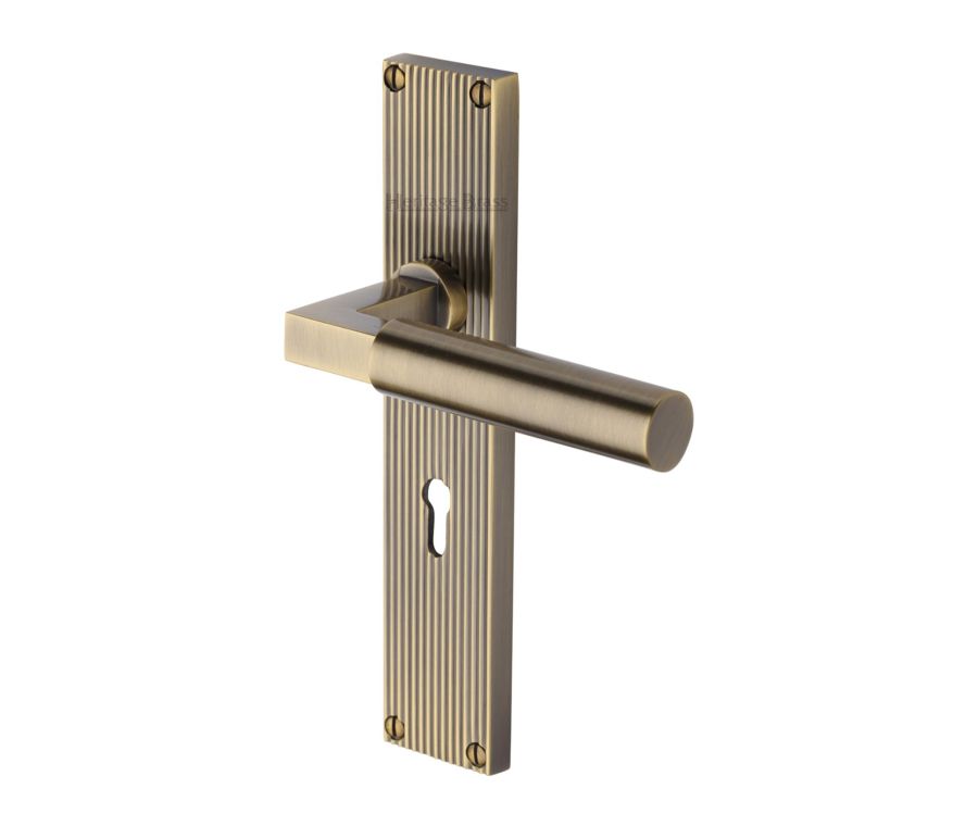 Heritage Brass Antique Brass Bauhaus Reeded Door Handle on Plate - Lever Lock
