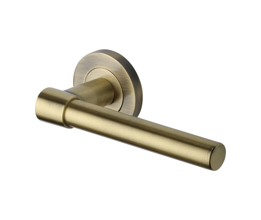 Antique Brass Phoenix Door Handle on Round Rose
