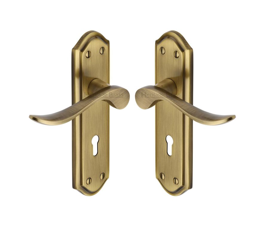 Heritage Brass Antique Brass Sandown Door Handle on Plate - Lever Lock