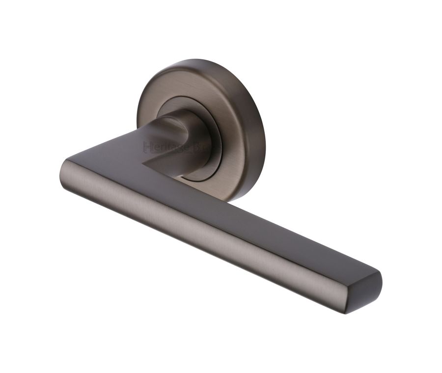 Matt Bronze Trident Door Handle on Round Rose