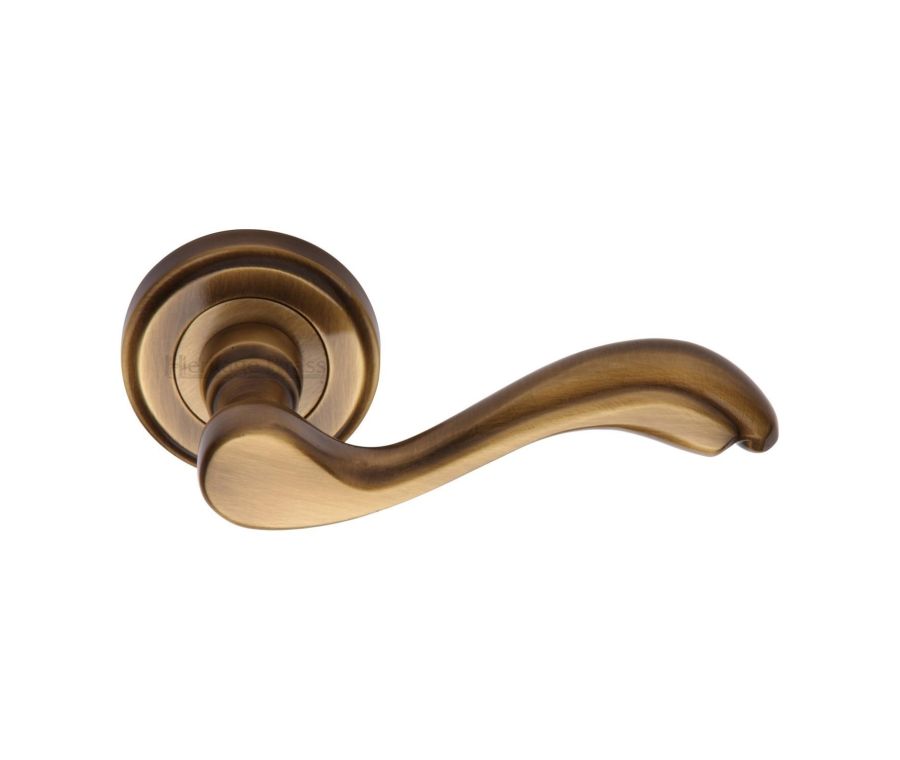 Antique Brass Lisboa Door Handle on Round Rose
