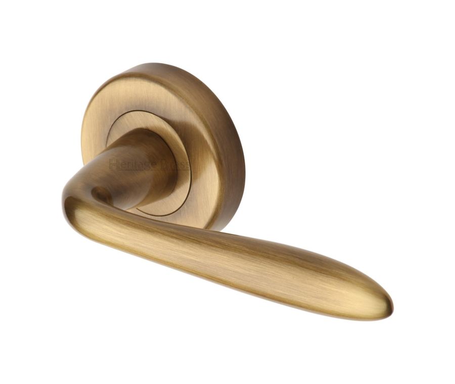 Antique Brass Sutton Door Handle on Round Rose