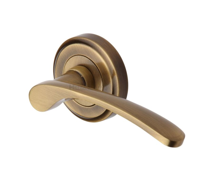 Antique Brass Sophia Door Handle on Round Rose