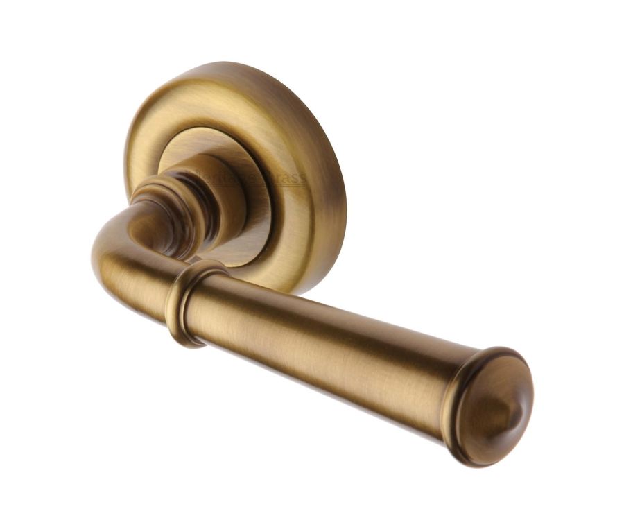 Antique Brass Colonial Door Handle on Round Rose