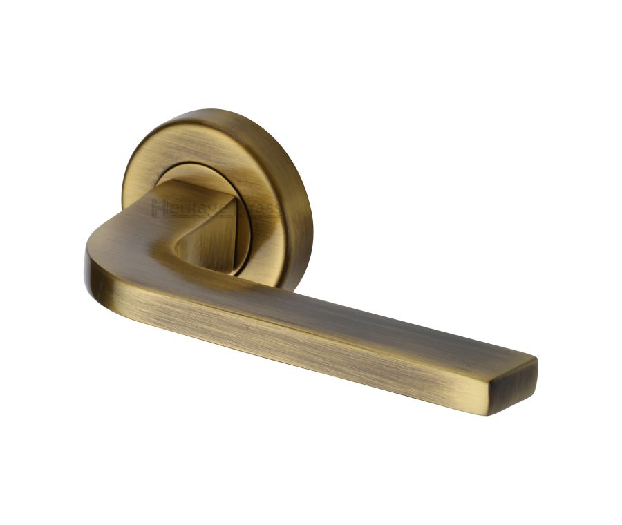 Antique Brass Bellagio Door Handle on Round Rose