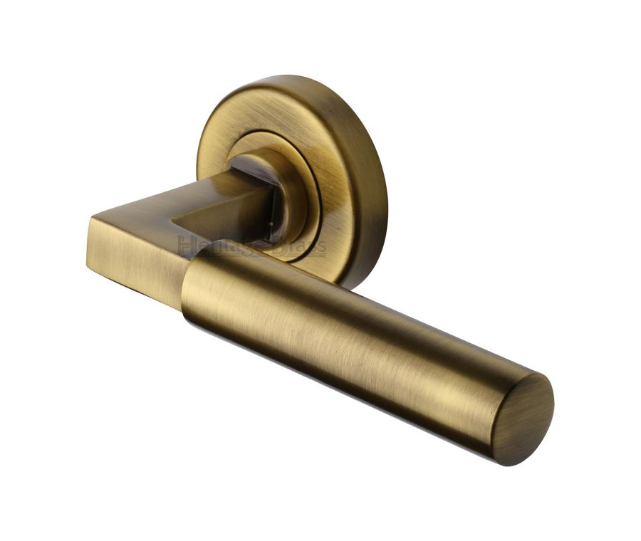 Antique Brass Bauhaus Door Handle on Round Rose