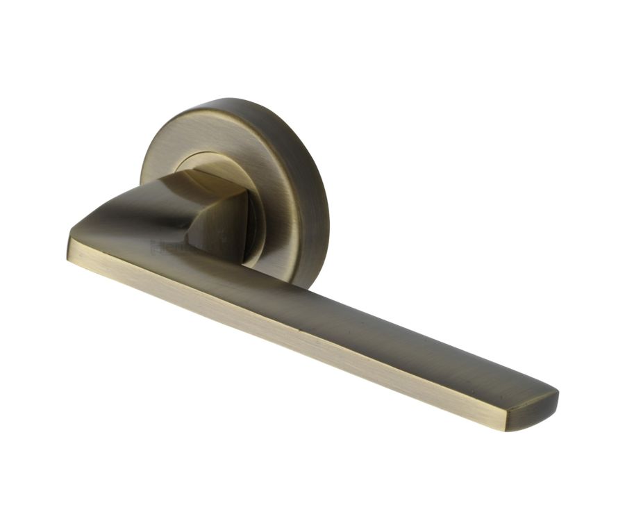 Antique Brass Metro Angled Door Handle on Round Rose
