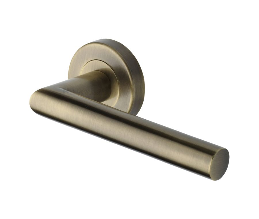 Antique Brass Athena Door Handle on Round Rose