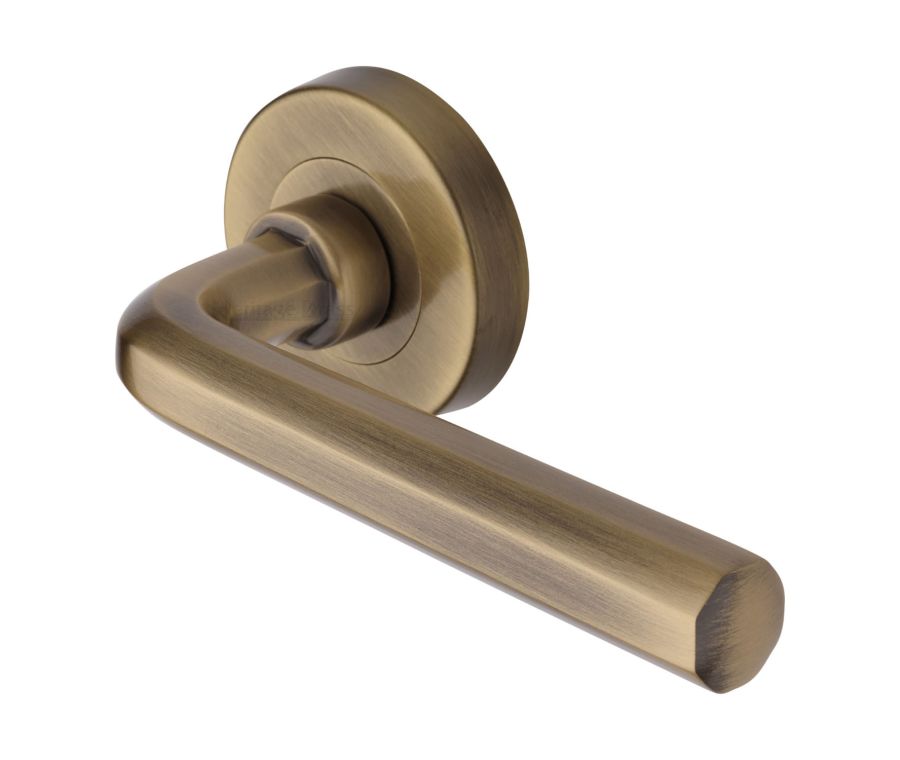 Antique Brass Octave Door Handle on Round Rose