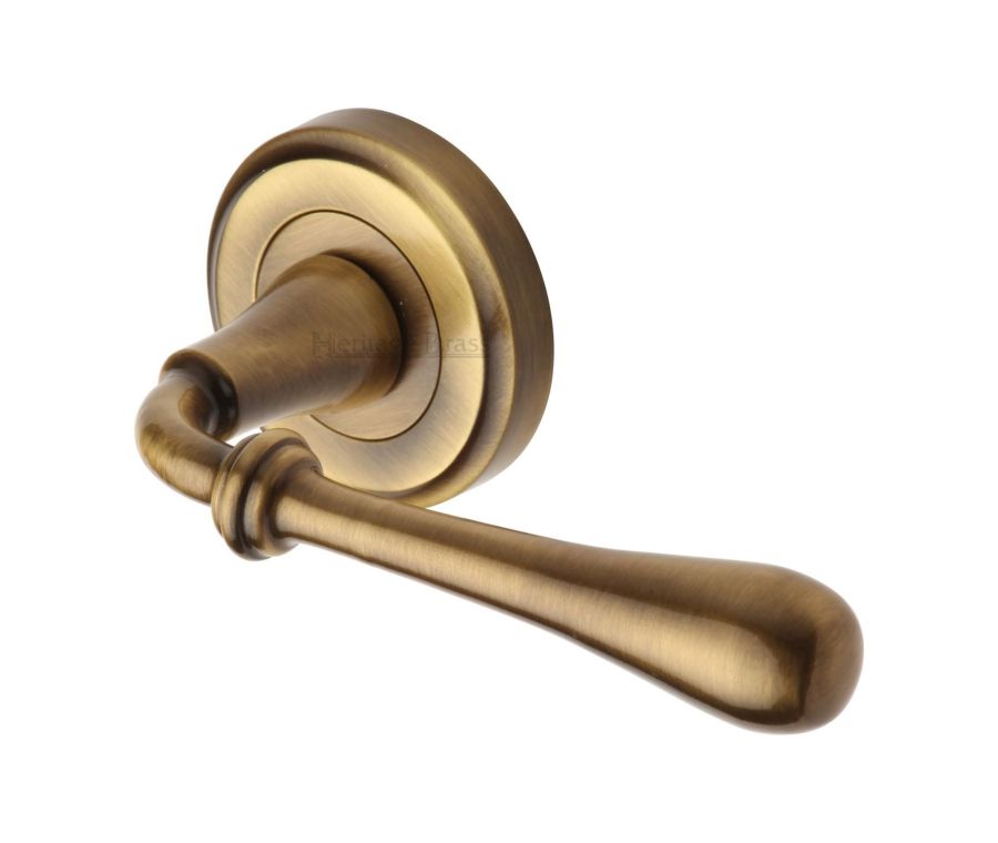 Antique Brass Roma Door Handle on Round Rose