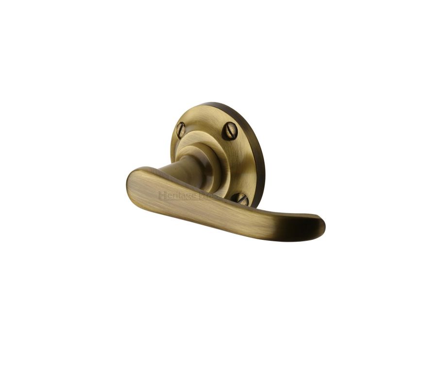 Antique Brass Windsor Door Handle on Round Rose