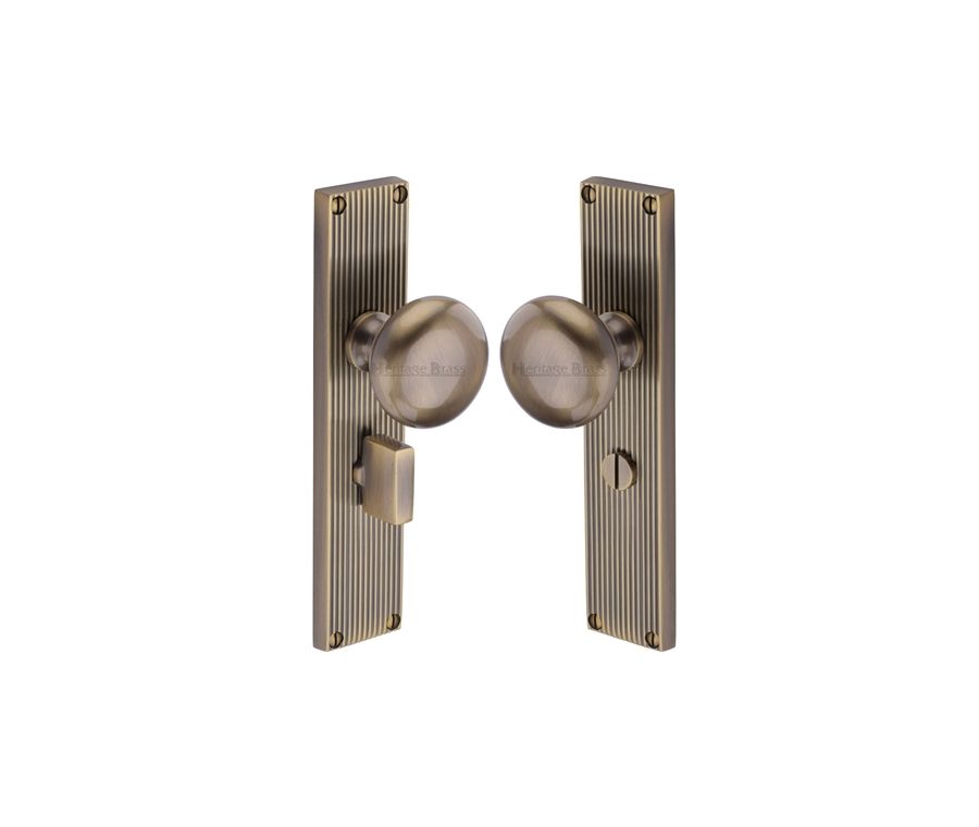 Heritage Brass Antique Brass Victoria Door Knob on Reeded Plate - Bathroom Set