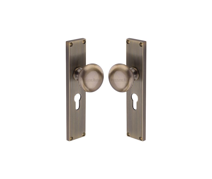 Heritage Brass Antique Brass Victoria Door Knob on Reeded Plate - Euro Profile Set