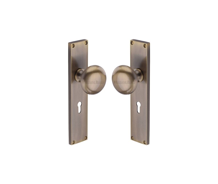Heritage Brass Antique Brass Victoria Door Knob on Plate - Lock Set
