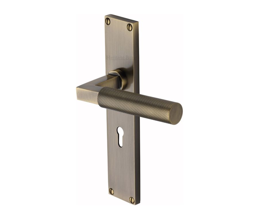 Heritage Brass Antique Brass Bauhaus Knurled Door Handle on Plate - Lever Lock