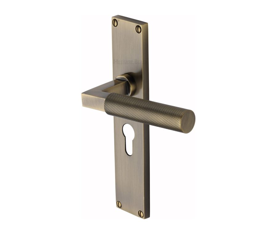 Heritage Brass Antique Brass Bauhaus Knurled Door Handle on Plate - Euro Profile