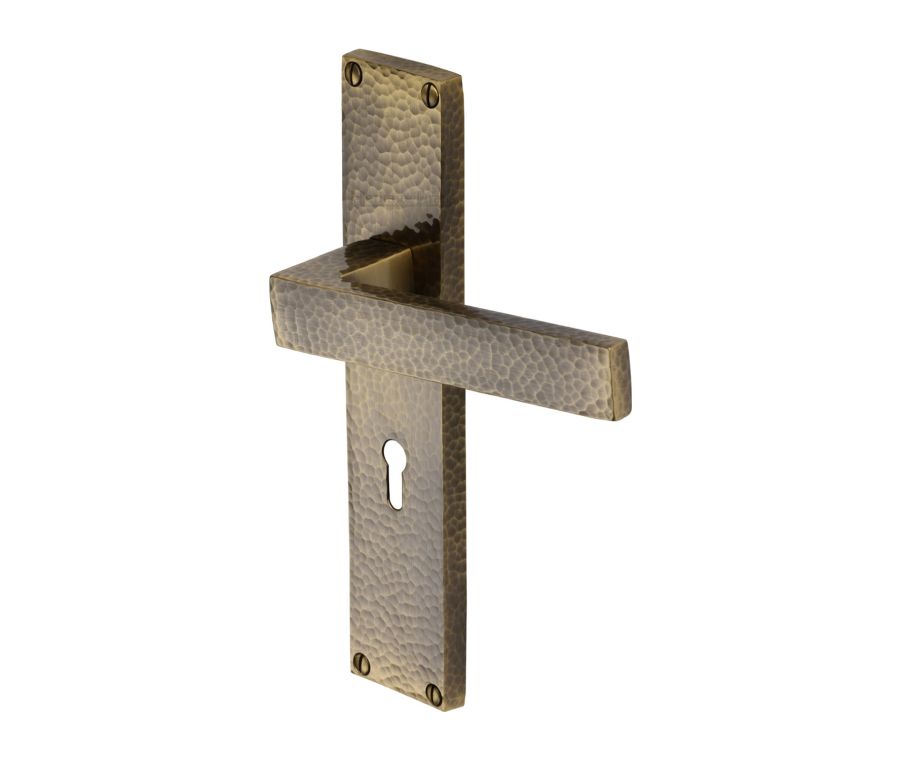 Heritage Brass Antique Brass Delta Hammered Door Handle on Plate - Lever Lock