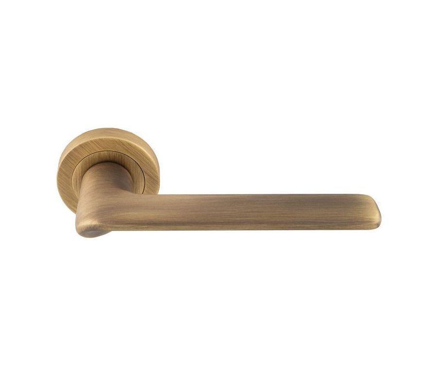 Set Manital Antique Brass Vortex Lever Furniture on round rose | VX5AB
