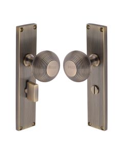 Heritage Brass Antique Brass Beehive Door Knob on Reeded Plate - Bathroom Set