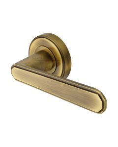 Antique Brass Century Door Handle on Round Rose