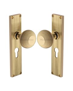 Heritage Brass Polished Brass Beehive Door Knob on Reeded Plate - Euro Profile Set