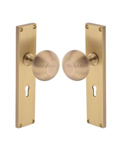 Heritage Brass Satin Brass Beehive Door Knob on Reeded Plate - Lock Set