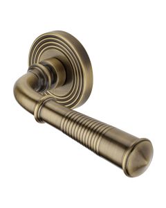 Antique Brass Bridgetown Reeded Door Handle on Round Rose