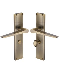 Heritage Brass Antique Brass Gio Reeded Door Handle on Plate - Bathroom Set