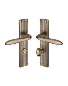 Heritage Brass Antique Brass Sutton Reeded Door Handle on Plate - Bathroom Set