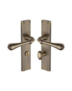 Heritage Brass Antique Brass Roma Reeded Door Handle on Plate - Bathroom Set
