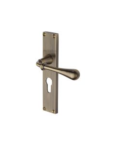 Heritage Brass Antique Brass Roma Reeded Door Handle on Plate - Euro Profile