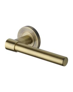 Antique Brass Phoenix Door Handle on Round Rose