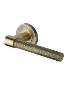Antique Brass Phoenix Knurled Door Handle on Round Rose