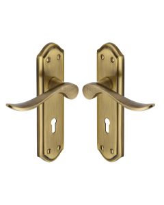 Heritage Brass Antique Brass Sandown Door Handle on Plate - Lever Lock