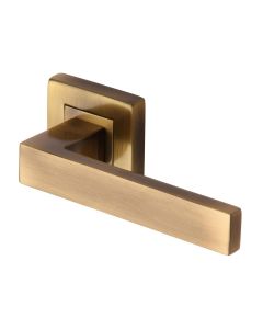 Antique Brass Delta Sq Door Handle on Square Rose