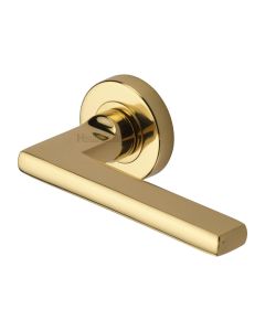 Polished Brass Trident Door Handle on Round Rose