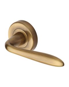 Antique Brass Sutton Door Handle on Round Rose