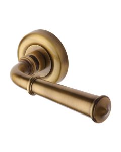 Antique Brass Colonial Door Handle on Round Rose