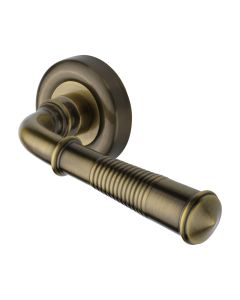 Antique Brass Colonial Reeded Door Handle on Round Rose