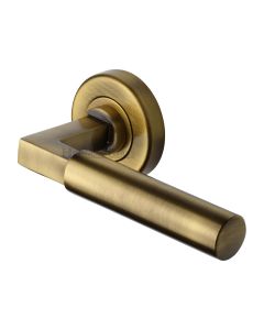 Antique Brass Bauhaus Door Handle on Round Rose