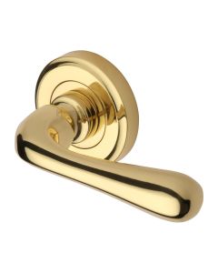 Polished Brass Charlbury Door Handle on Round Rose