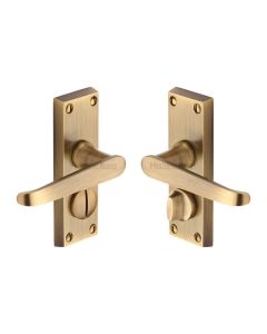 Heritage Brass Antique Brass Victoria Short Door Handle on Plate - Bathroom Set